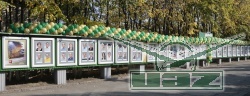 На заводской ДОСКЕ ПОЧЕТА - портреты лучших работников